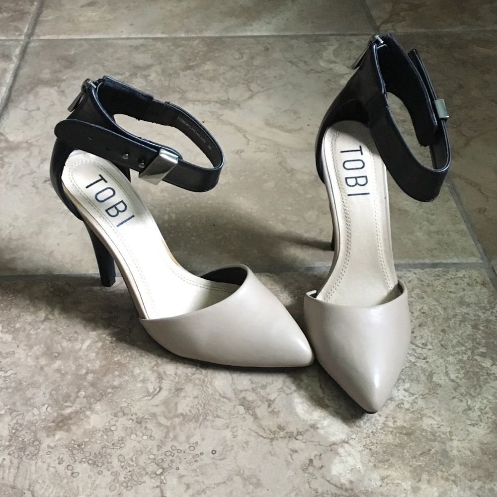 Black and toast pointed toe heels